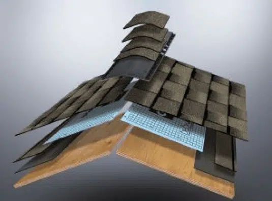 Exploded view of a roofing system showing layers including shingles, underlayment, insulation, and wooden decking, illustrating the components of a modern roof.