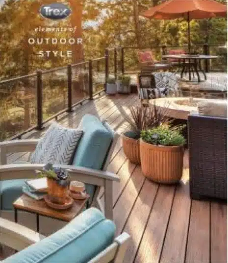 Trex outdoor living space featuring stylish seating, a wooden deck, and potted plants, showcasing elements of outdoor style with a relaxing atmosphere.