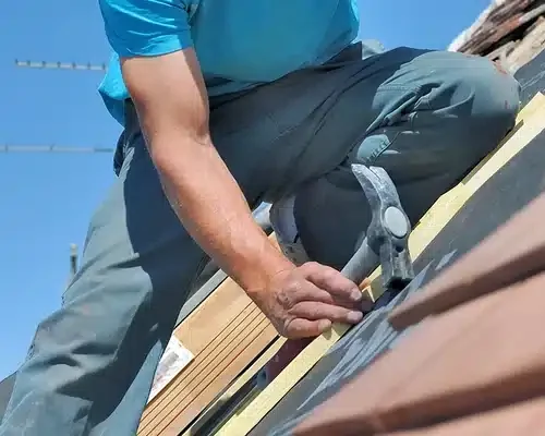 Installing New Roof Shingles.jpg e1740158360784